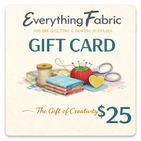 Everything Fabric $25 gift card with sewing supplies on a beige background
