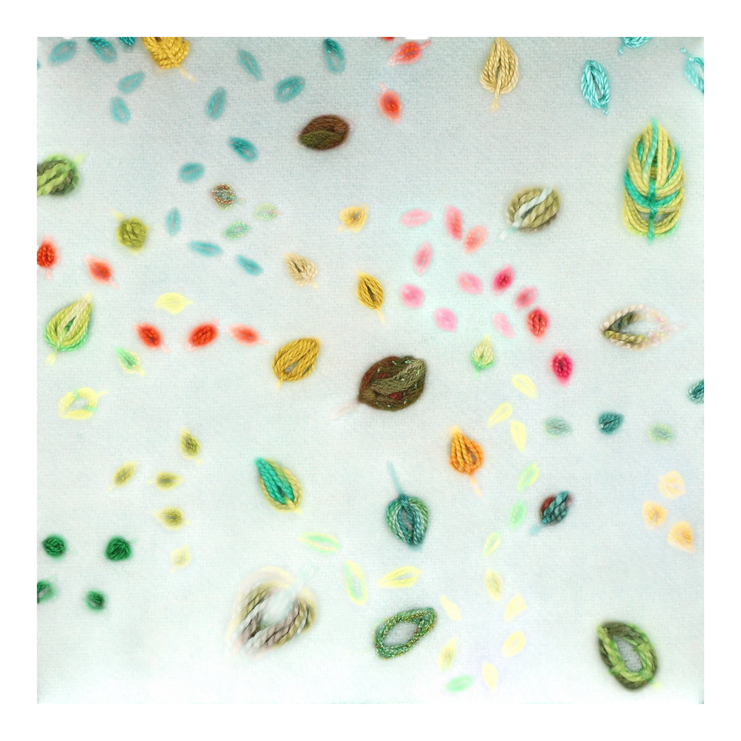 Everything Fabric embroidery sample showing colorful raised leaf stitches and dimensional loops on light blue fabric