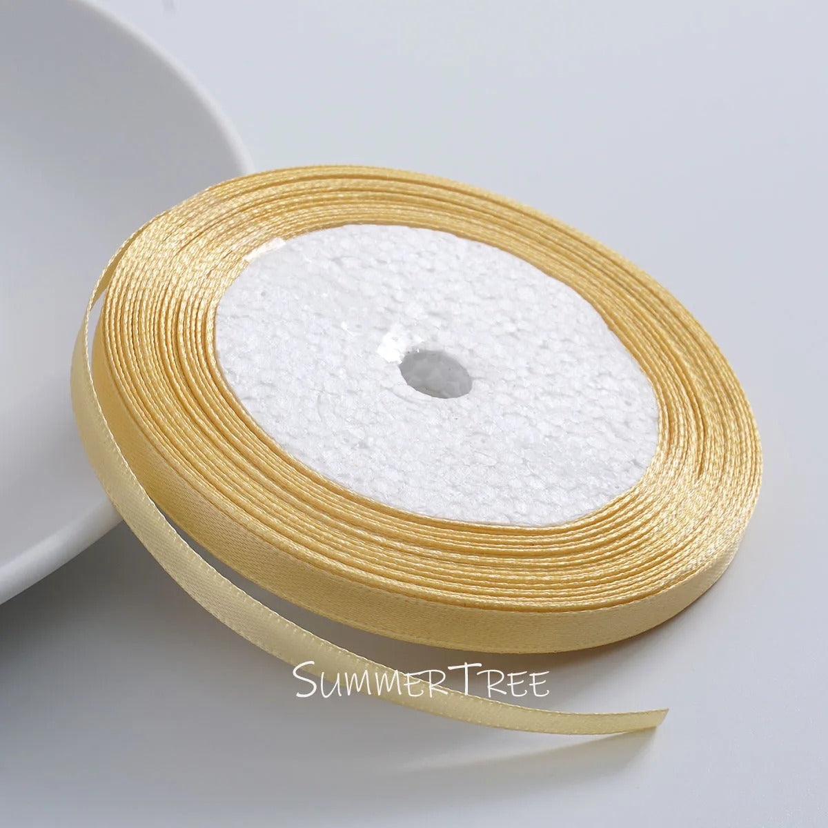 6mm single-sided satin ribbon in Champagne Gold, sold by the yard — S-04-006-XB-1