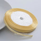 6mm single-sided satin ribbon in Champagne Gold, sold by the yard — S-04-006-XB-1