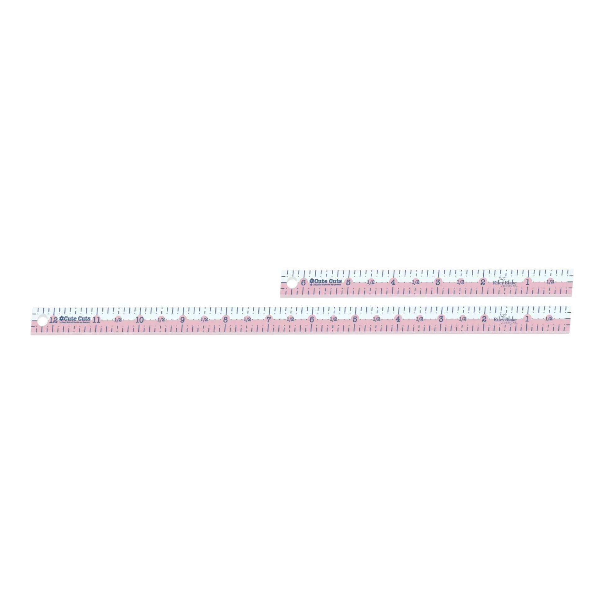 Lori Holt pink fabric ruler set with clear inch and fraction markings for sewing and quilting. Includes a 12-inch and a 6-inch ruler.