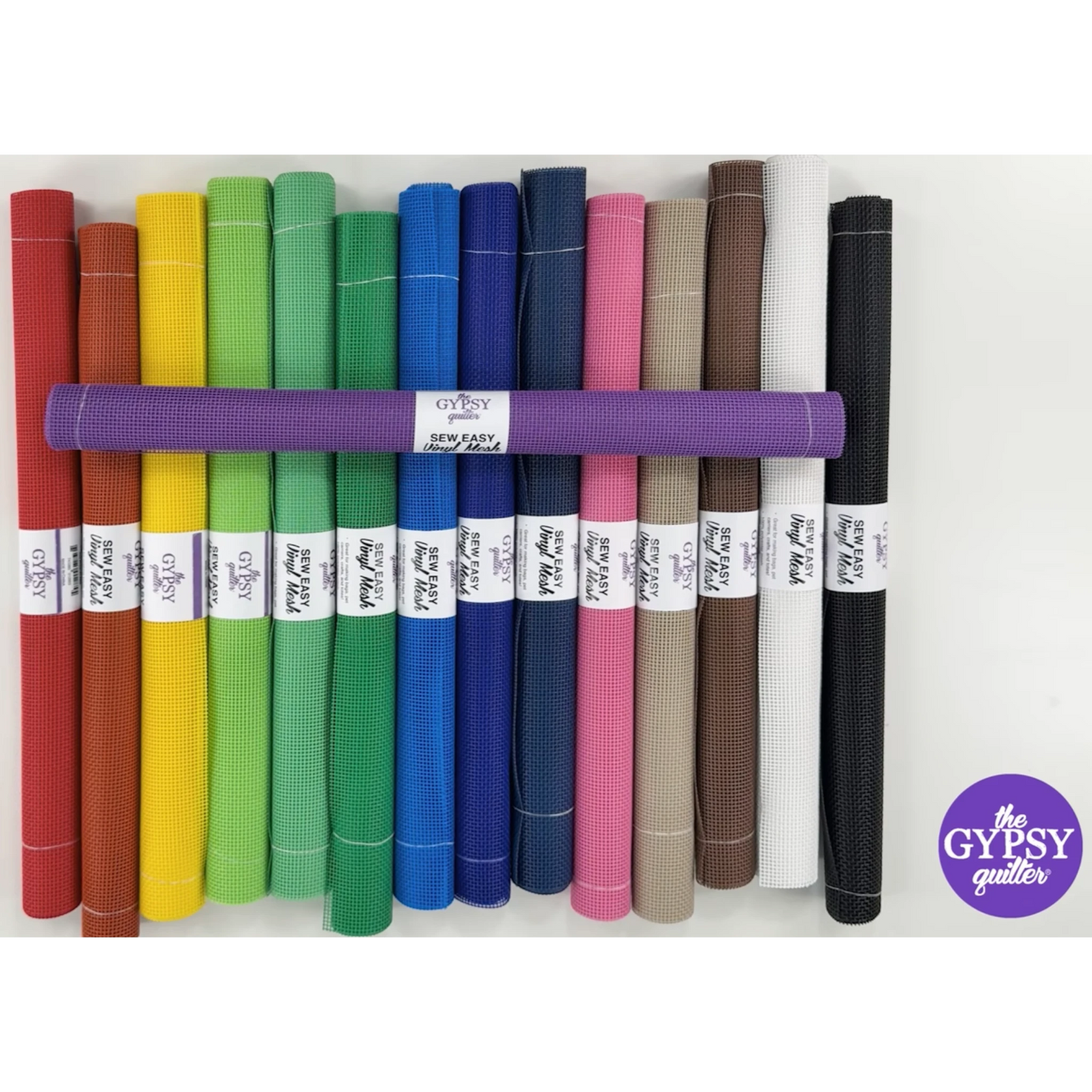 Everything Fabric Sew Easy vinyl mesh rolls in a vibrant rainbow color palette for sewing and craft projects.