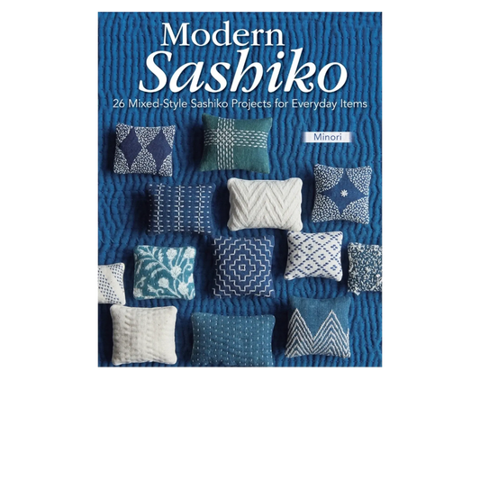 Everything Fabric Modern Sashiko book cover featuring various small stitched pillows in blue and white patterns on a quilted blue background.