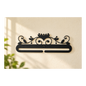 Black 12 inch Lotus quilt hanger displayed on a warm ivory wall