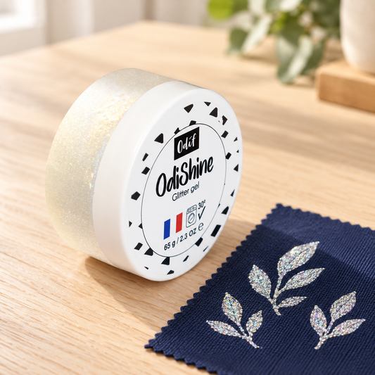 Odif OdiShine Opal 65g jar with an illustrative glitter leaf fabric sample