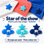 Prym Love 12.4mm star snaps in Blue, Turquoise and Ink. Thirty snaps per pack in a three-colour mix; Prym VARIO pliers and Color Snaps tool set required, sold separately.