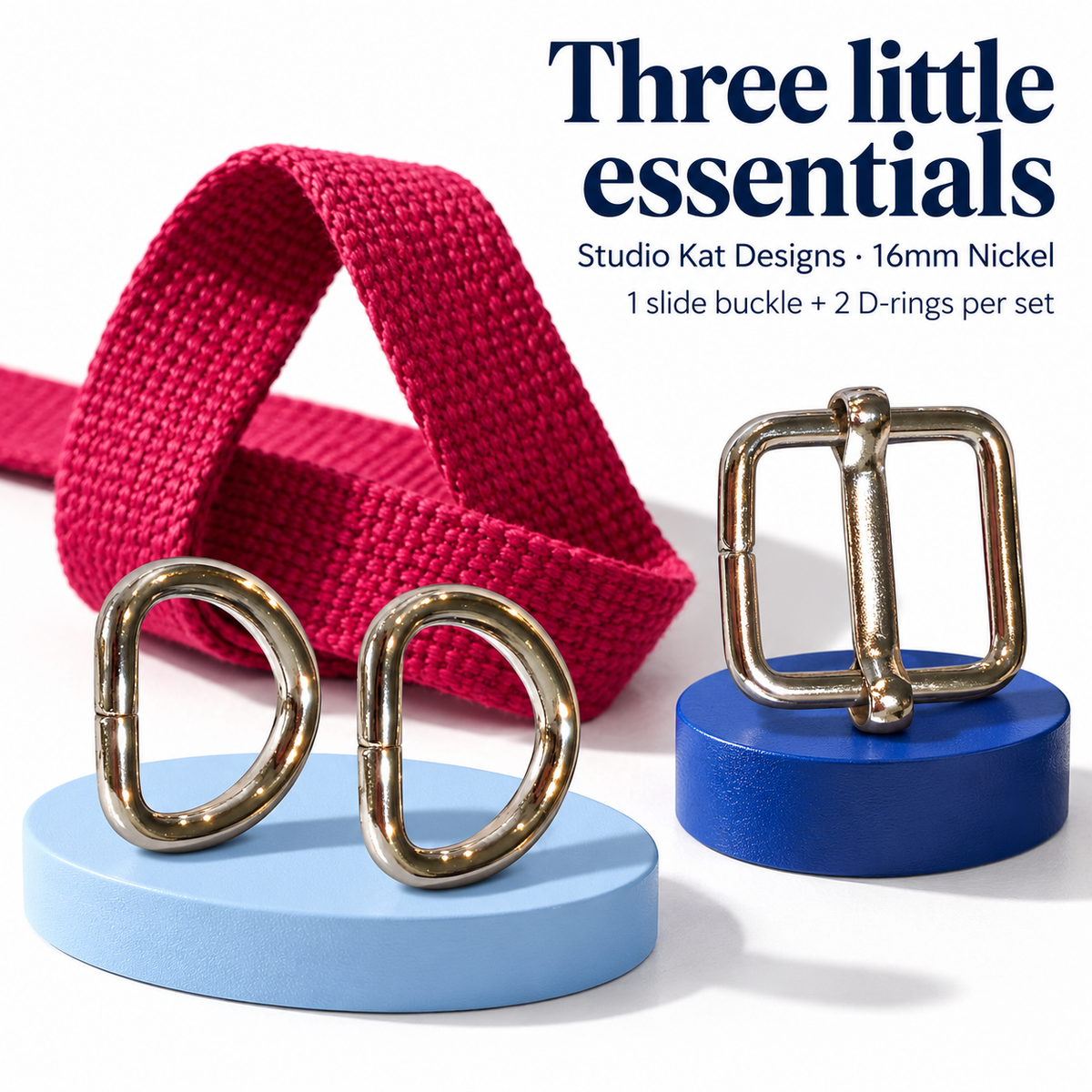 Studio Kat Designs 16mm nickel set: one slide buckle and two D-rings, shown with raspberry webbing for inspiration.